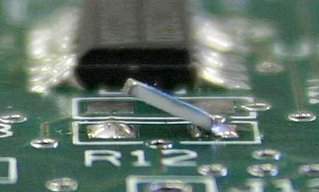 Tombstoned resistor on PCB pad