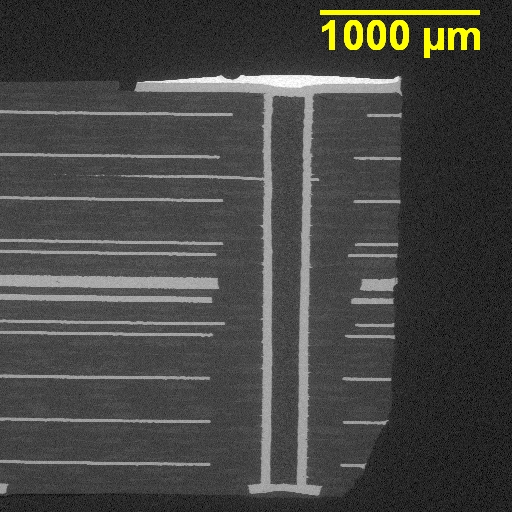 Microscopic view of plated vias on a high-frequency board