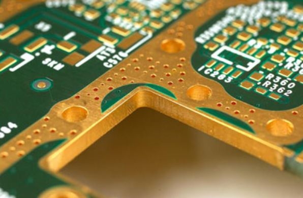 Close-up of a PCB with metallic edge plating for grounding