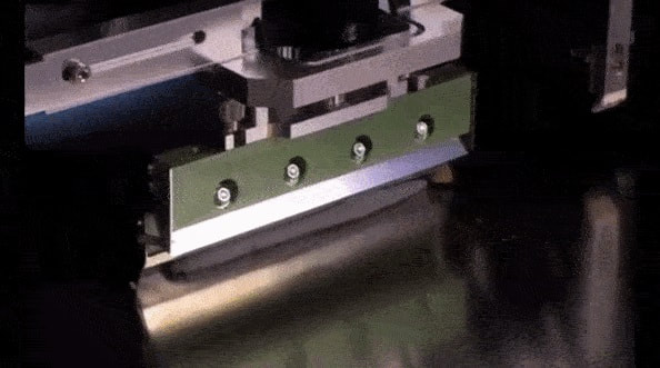 Adjusting squeegee pressure on a solder paste printer
