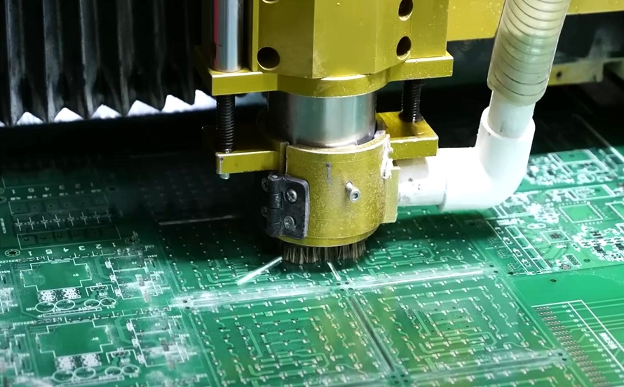 High-speed router cutting through a PCB panel